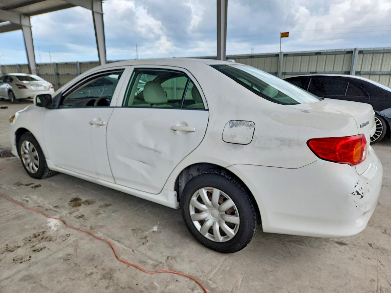 2009 Toyota Corolla Le Белый vin: 1NXBU40E49Z157709