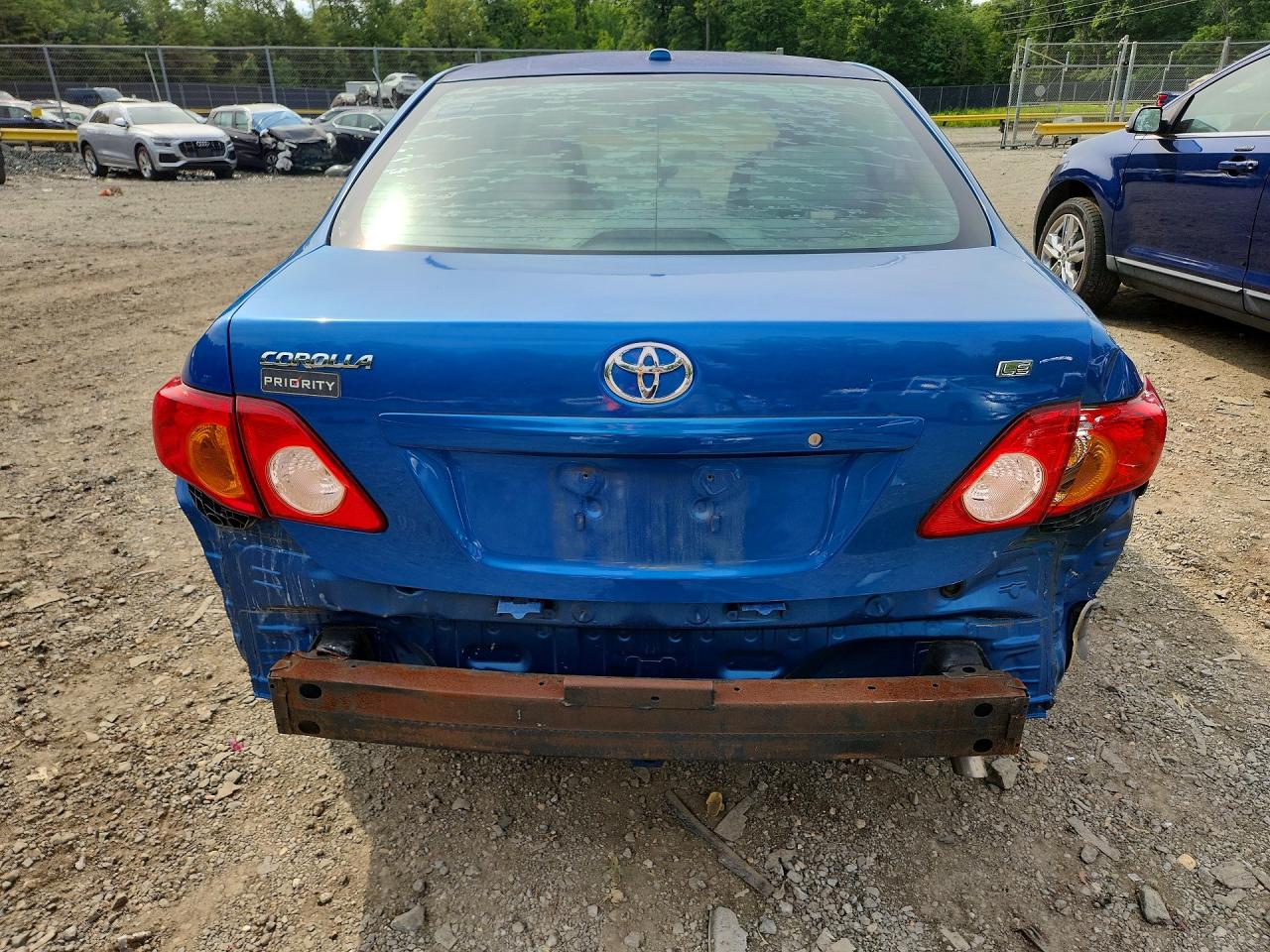 2009 Toyota Corolla Le Blue vin: 1NXBU40E59Z016048
