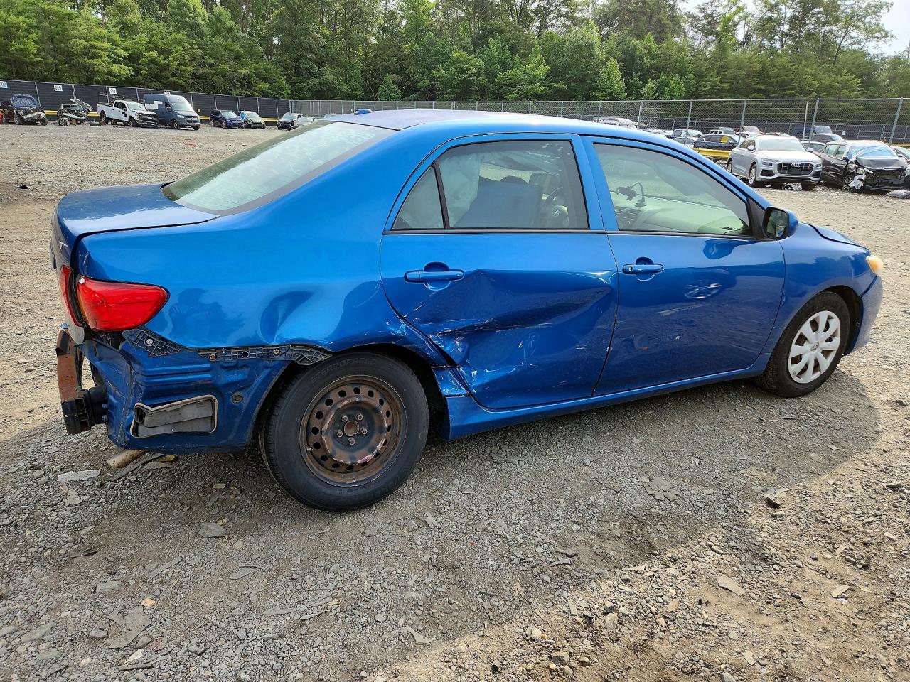 2009 Toyota Corolla Le Blue vin: 1NXBU40E59Z016048