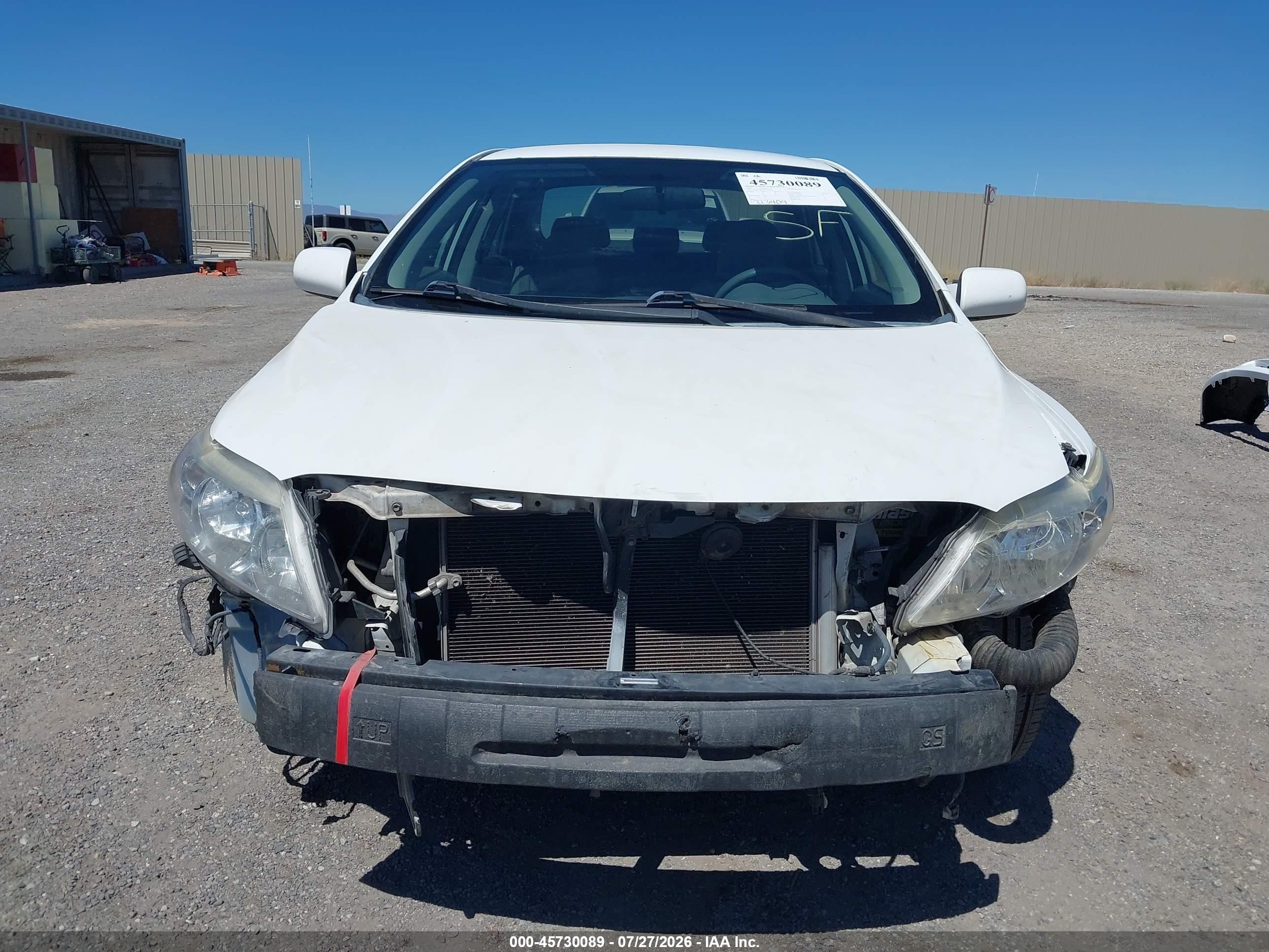2009 Toyota Corolla   White vin: 1NXBU40E59Z016566