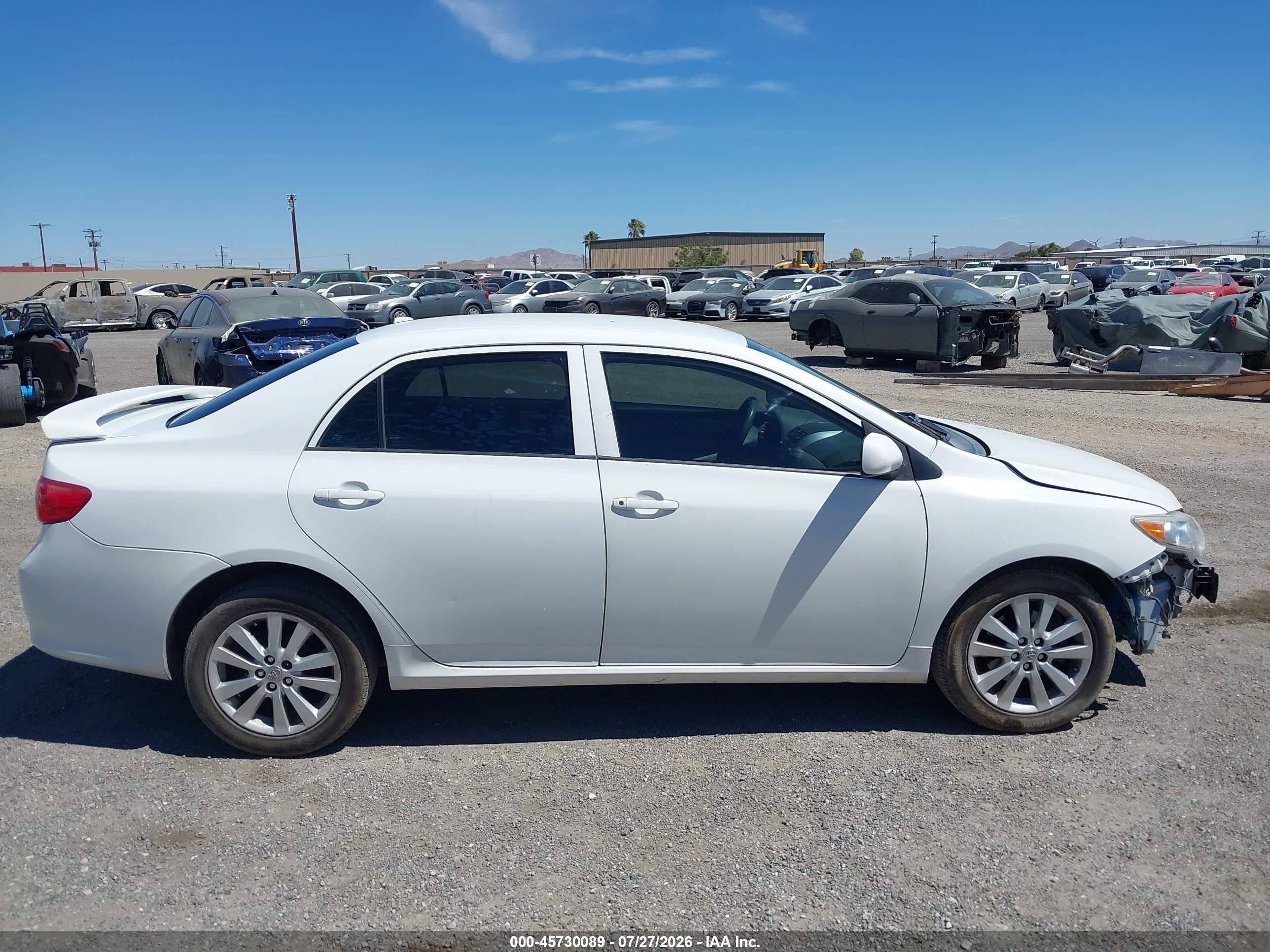 2009 Toyota Corolla   White vin: 1NXBU40E59Z016566