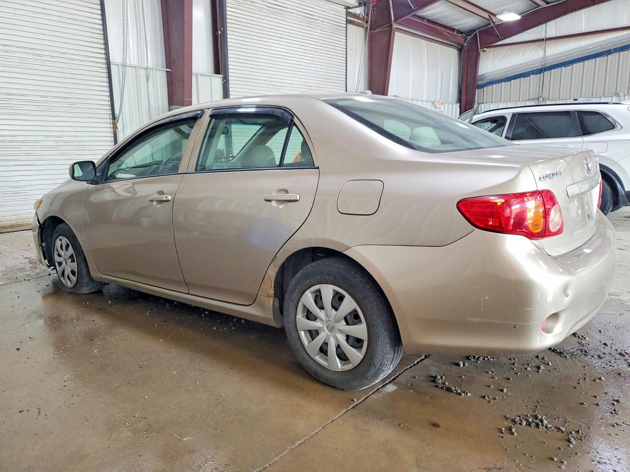 2009 Toyota Corolla Le Gold vin: 1NXBU40E59Z054136