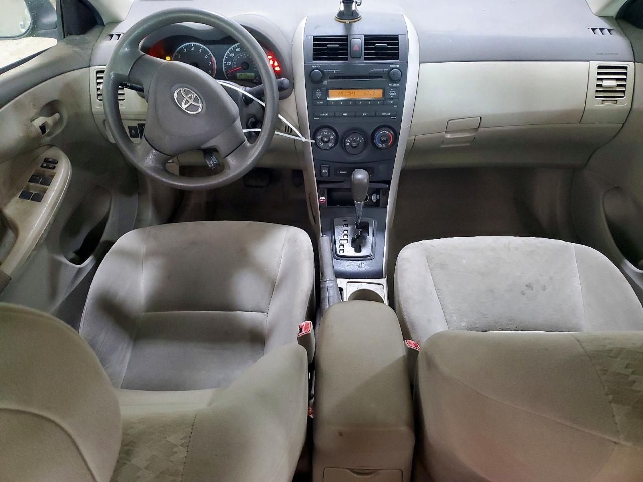 2009 Toyota Corolla Le Gold vin: 1NXBU40E59Z054136