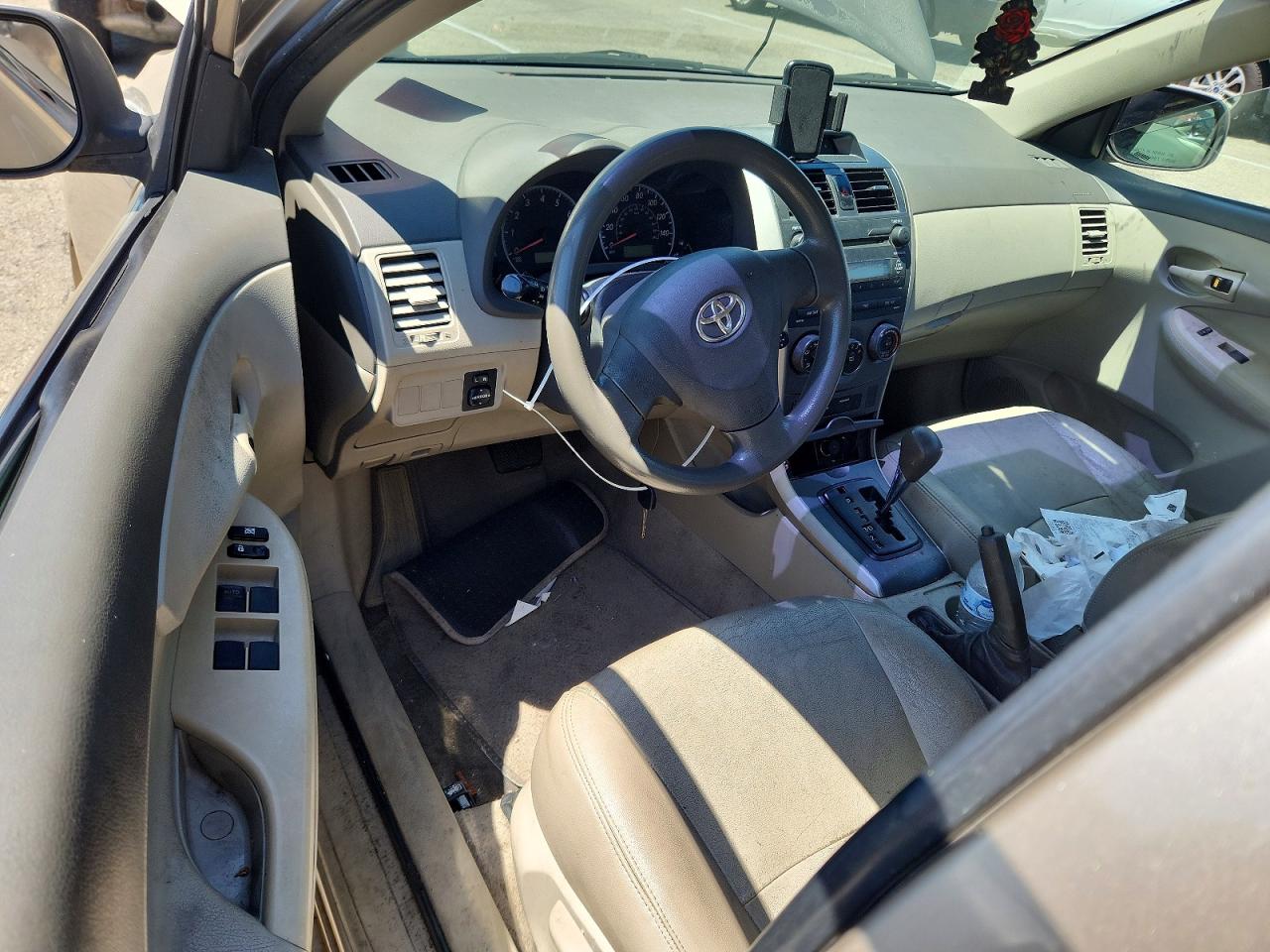 2009 Toyota Corolla Le Tan vin: 1NXBU40E59Z073365