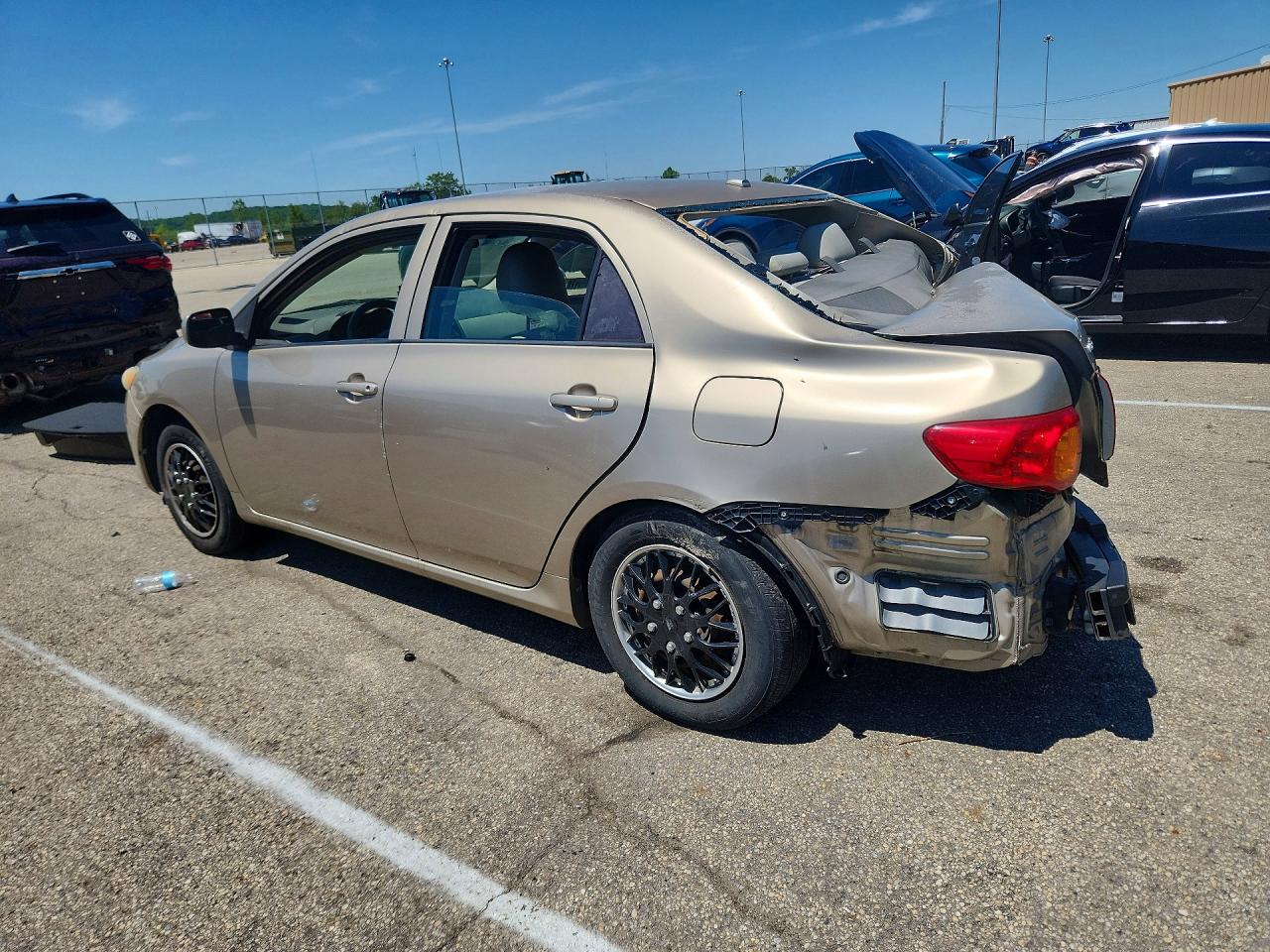2009 Toyota Corolla Le Tan vin: 1NXBU40E59Z073365