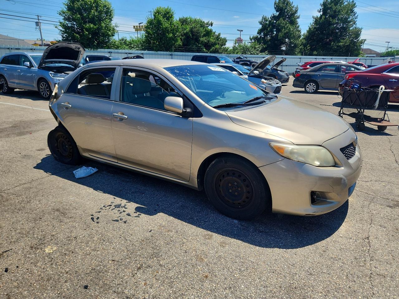 2009 Toyota Corolla Le Tan vin: 1NXBU40E59Z073365