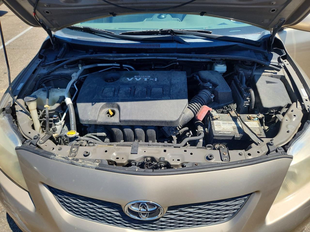 2009 Toyota Corolla Le Tan vin: 1NXBU40E59Z073365