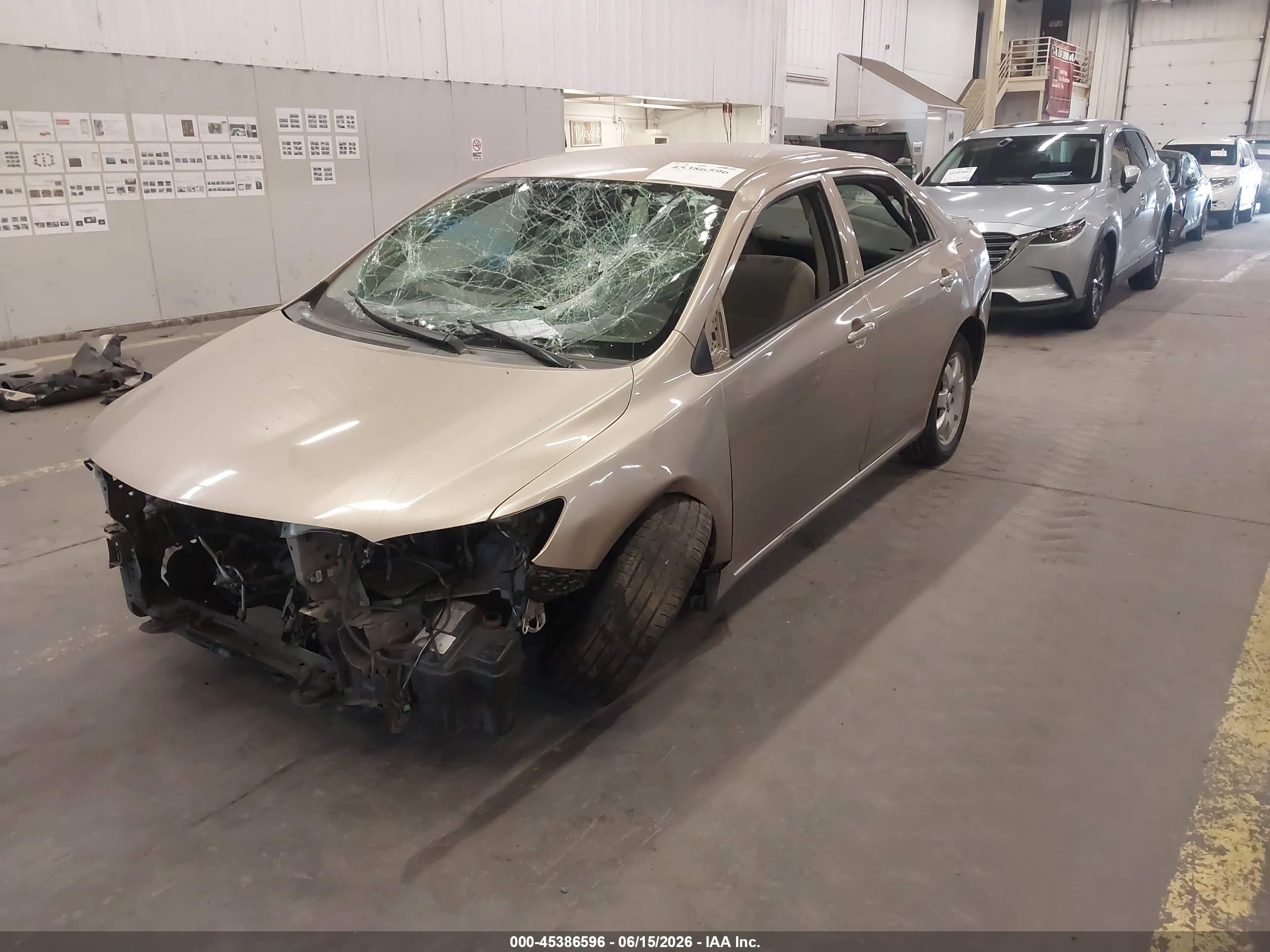 2009 Toyota Corolla Le Beige vin: 1NXBU40E59Z098380