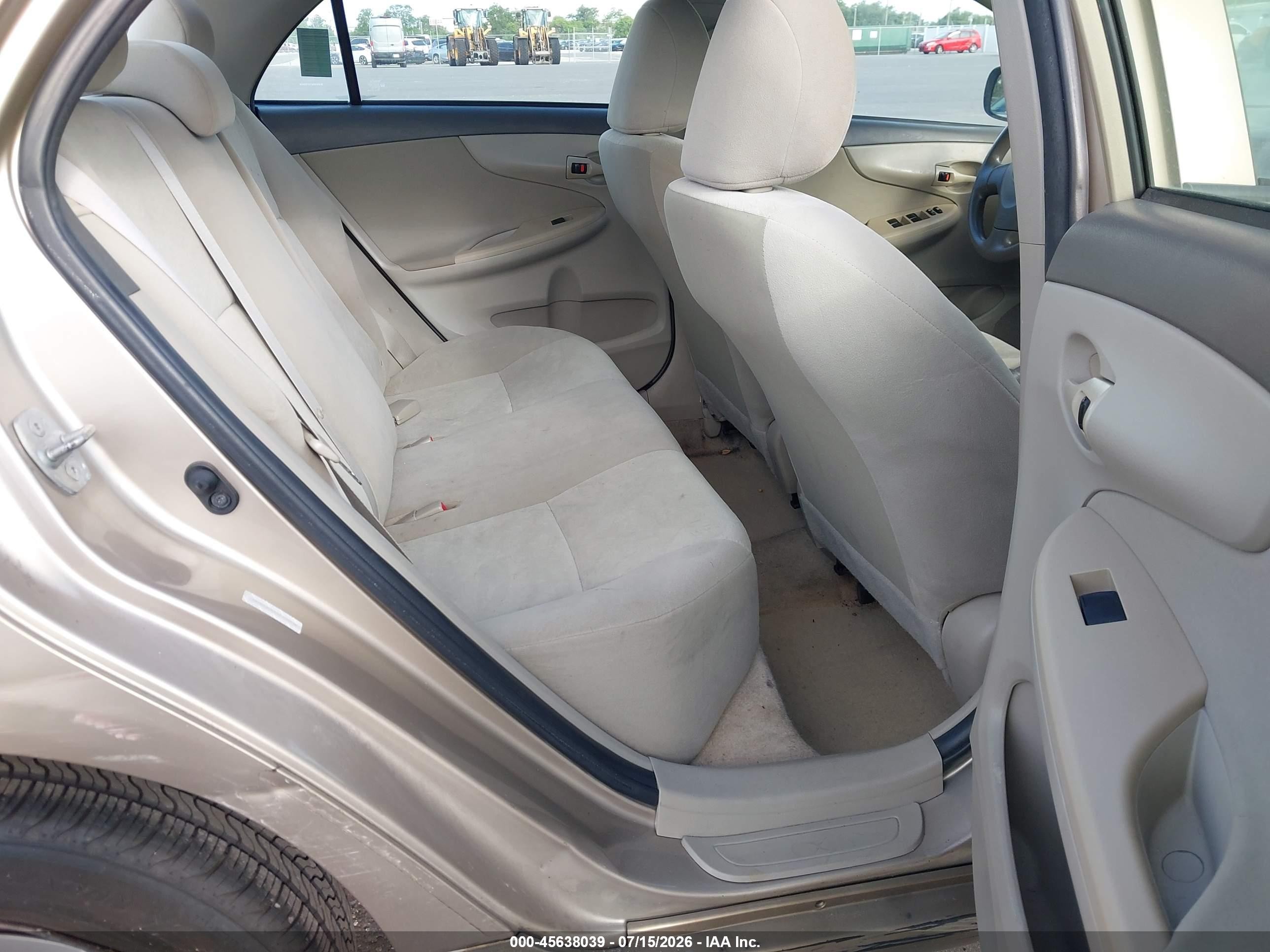 2009 Toyota Corolla Le Gold vin: 1NXBU40E59Z100838