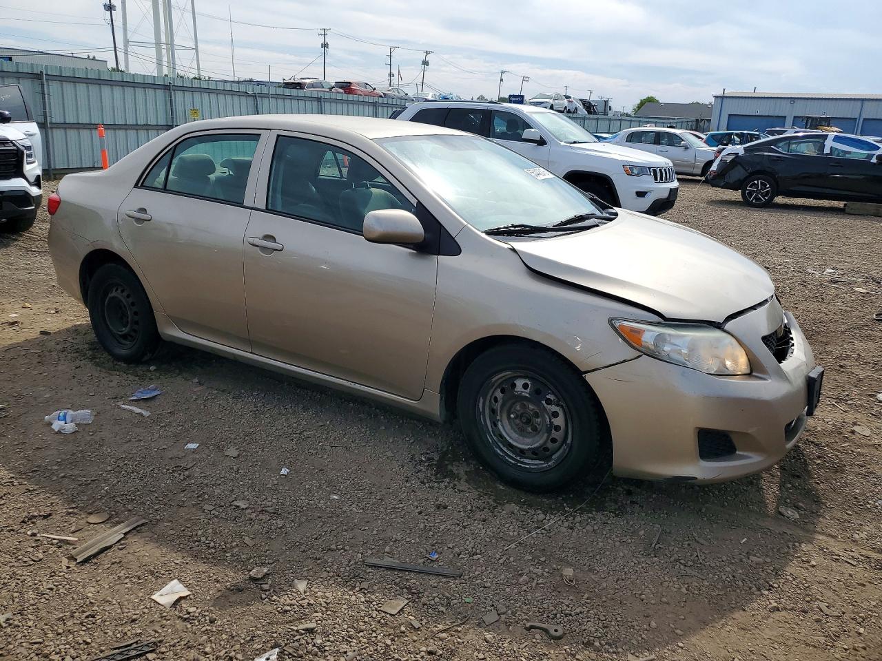 2009 Toyota Corolla Le Gold vin: 1NXBU40E59Z132995