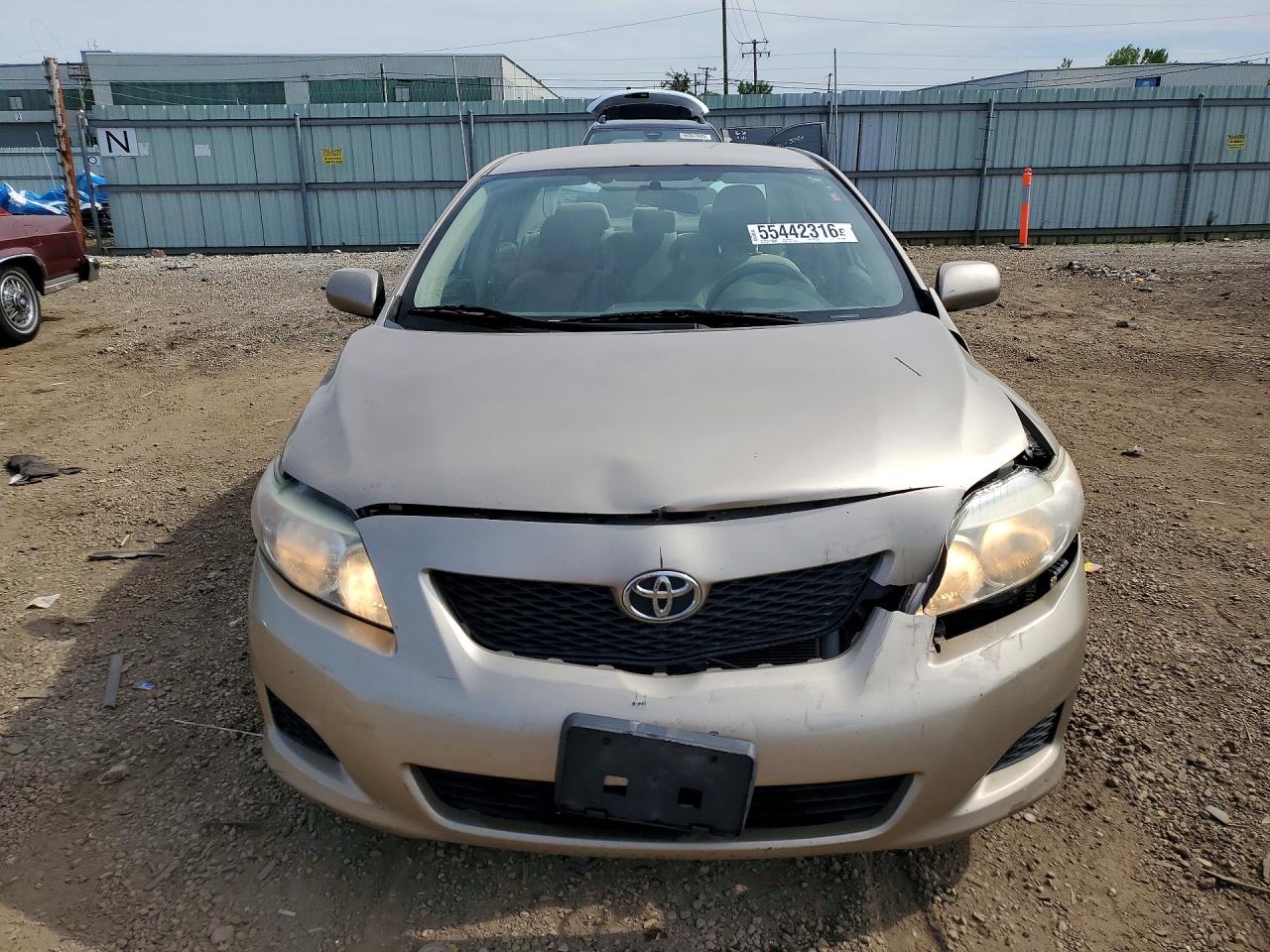 2009 Toyota Corolla Le Gold vin: 1NXBU40E59Z132995