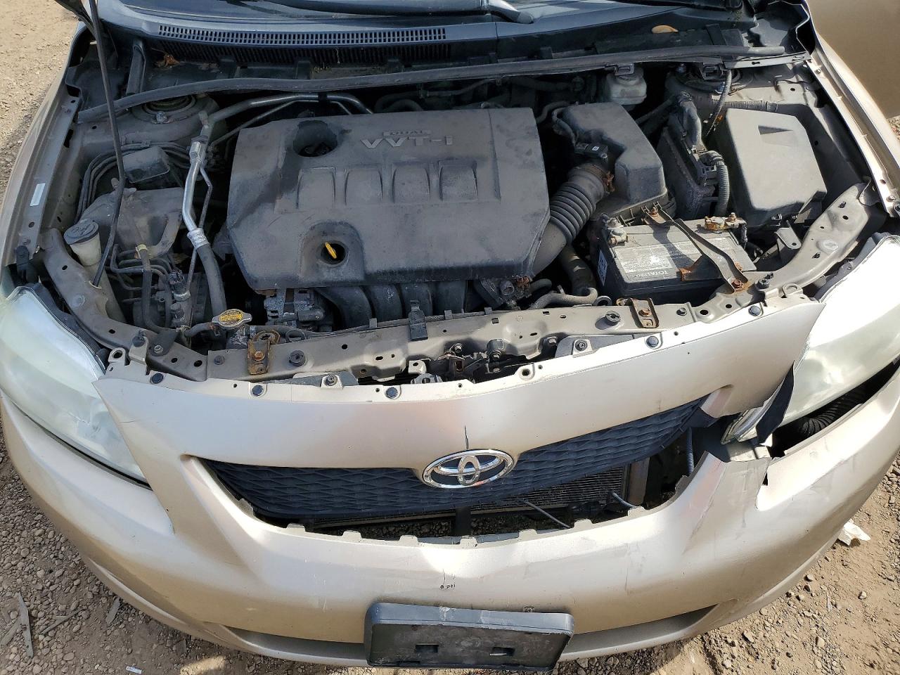 2009 Toyota Corolla Le Gold vin: 1NXBU40E59Z132995