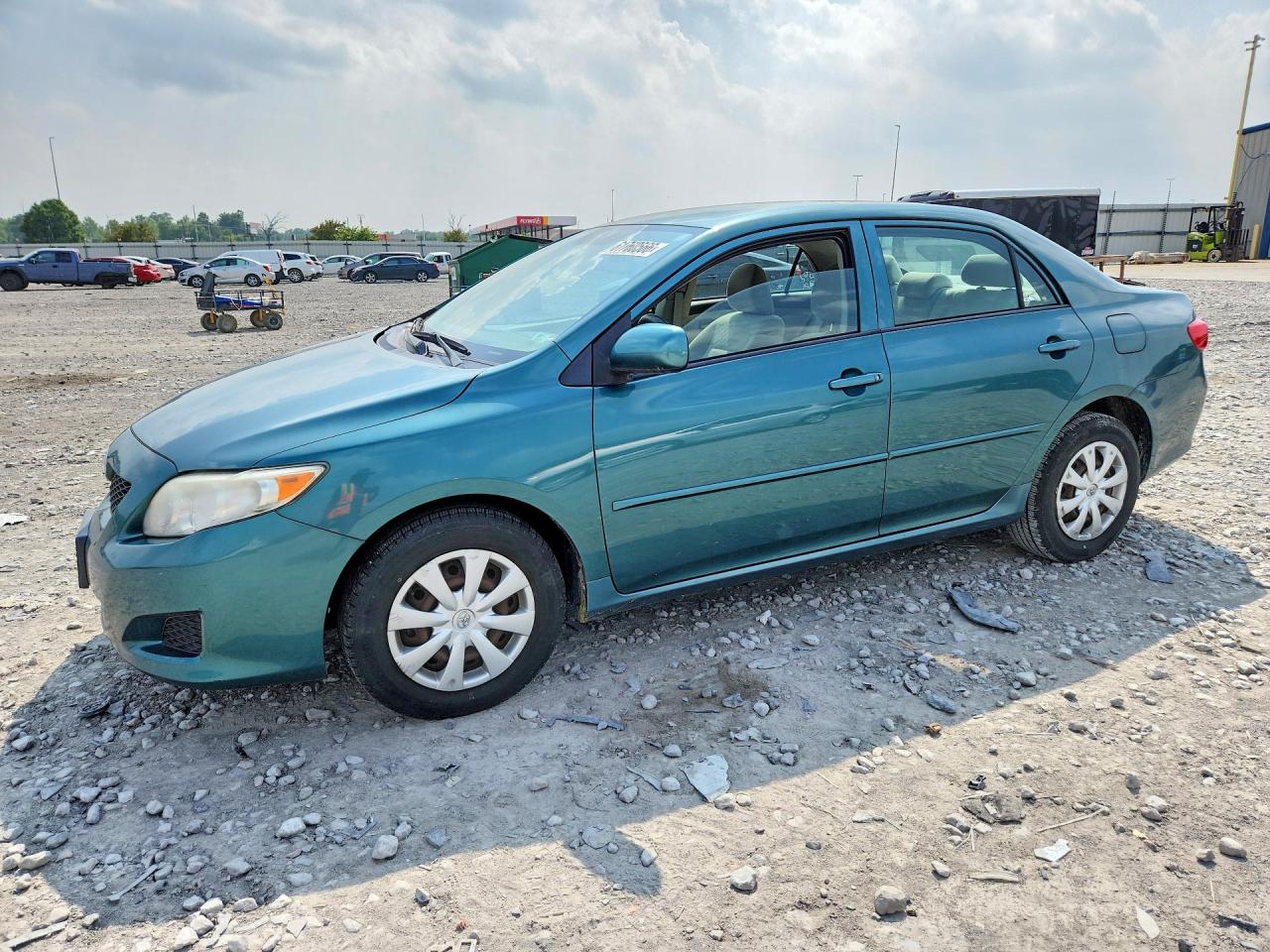 2009 Toyota Corolla Le Teal vin: 1NXBU40E59Z145665