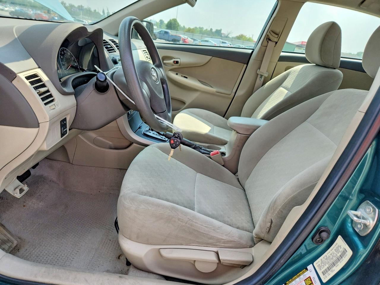 2009 Toyota Corolla Le Teal vin: 1NXBU40E59Z145665