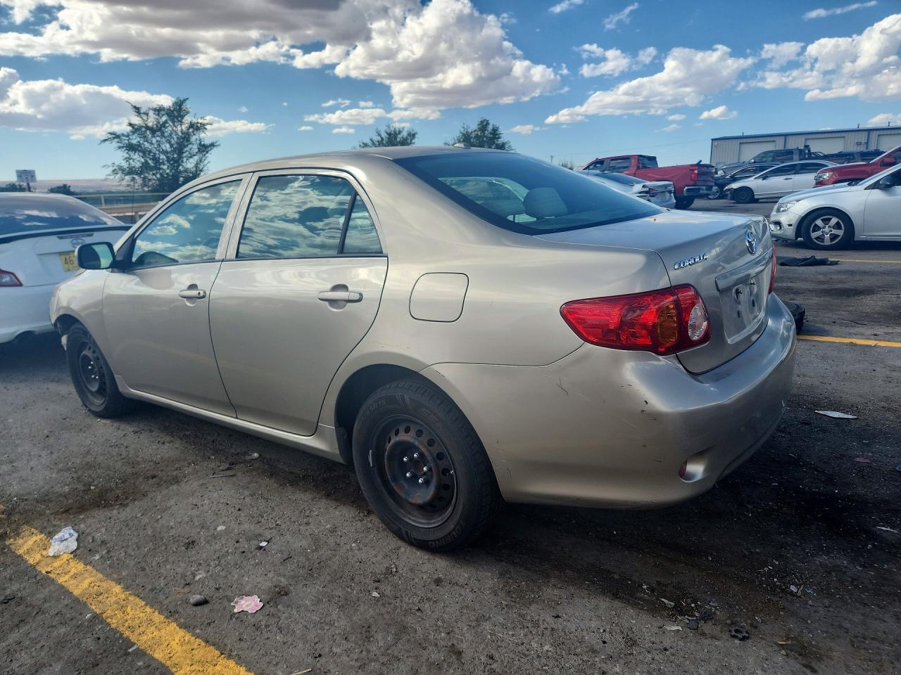 2009 Toyota Corolla Le Gold vin: 1NXBU40E69Z115185
