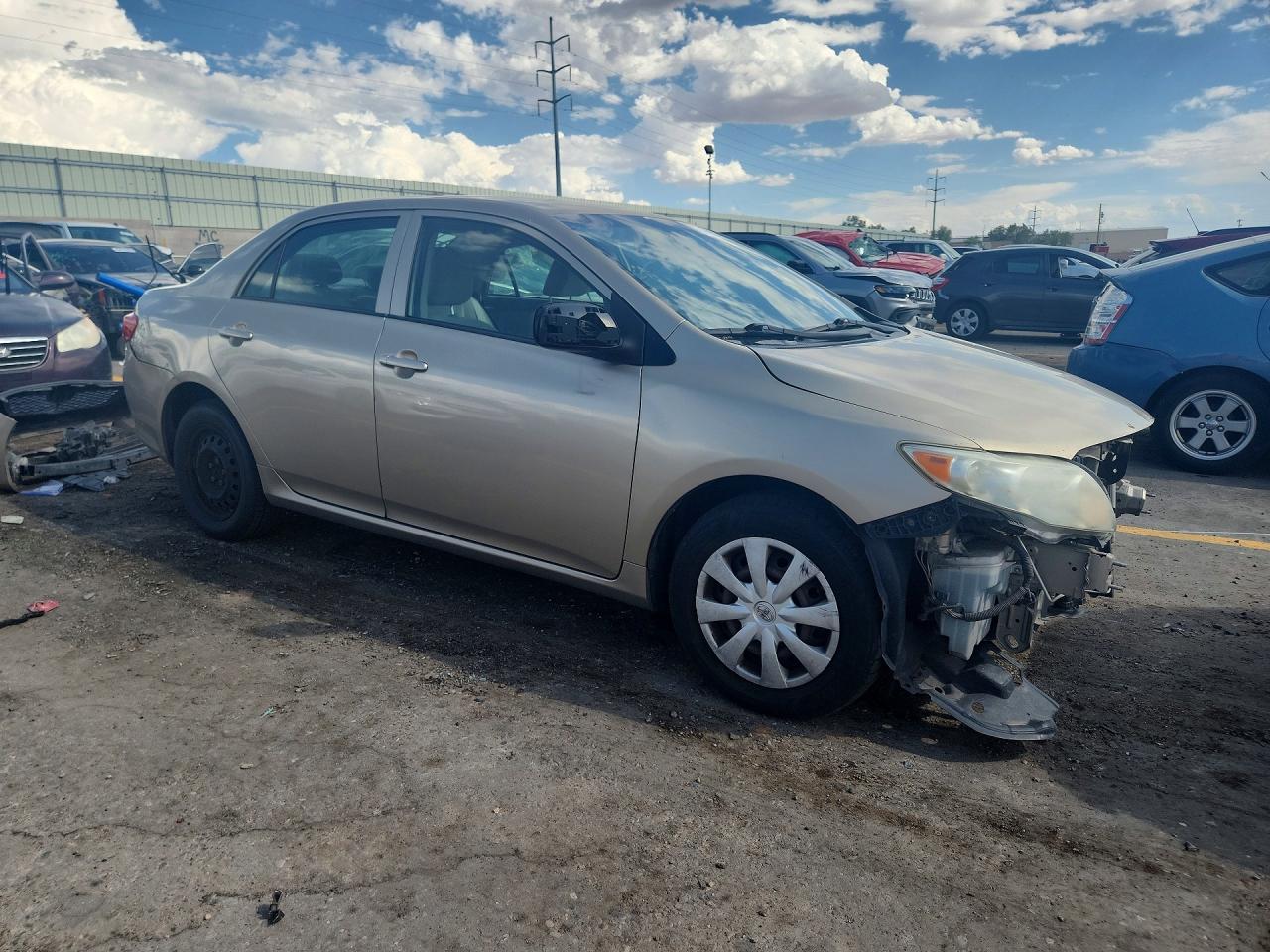 2009 Toyota Corolla Le Gold vin: 1NXBU40E69Z115185