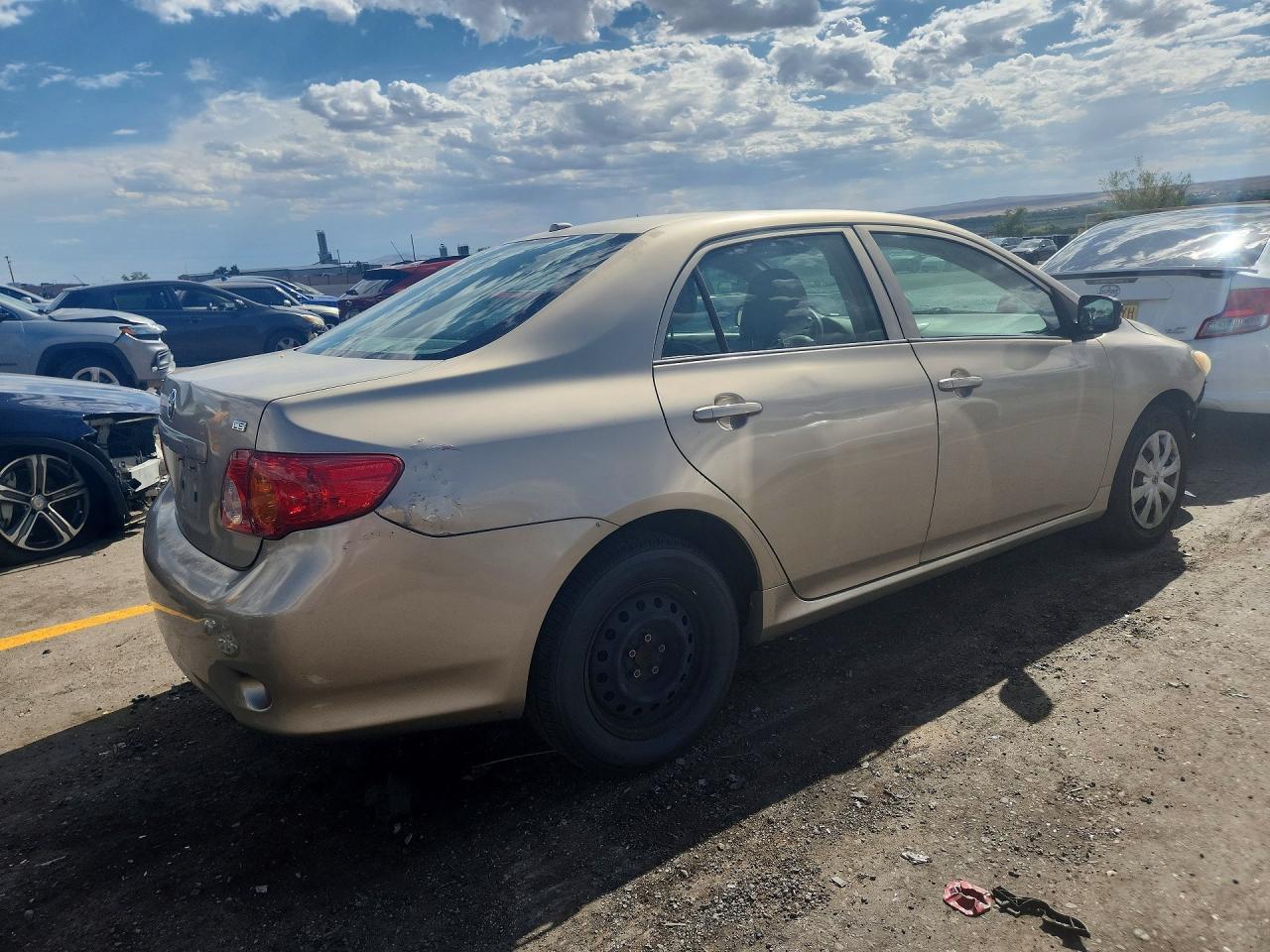 2009 Toyota Corolla Le Gold vin: 1NXBU40E69Z115185