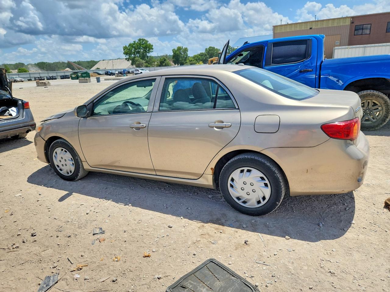 2009 Toyota Corolla Le Tan vin: 1NXBU40E69Z130236