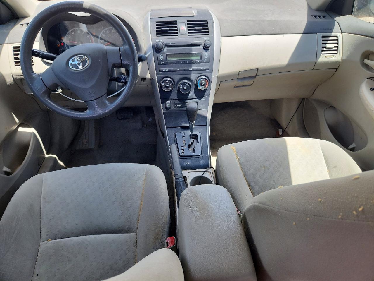 2009 Toyota Corolla Le Tan vin: 1NXBU40E69Z130236