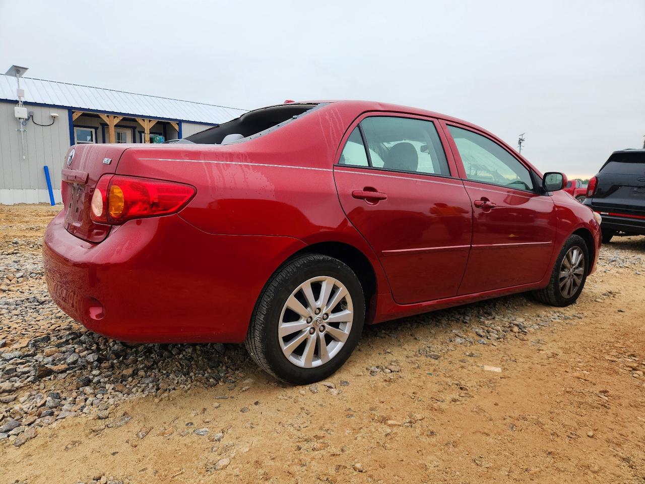 2009 Toyota Corolla Le Красный vin: 1NXBU40E69Z138062