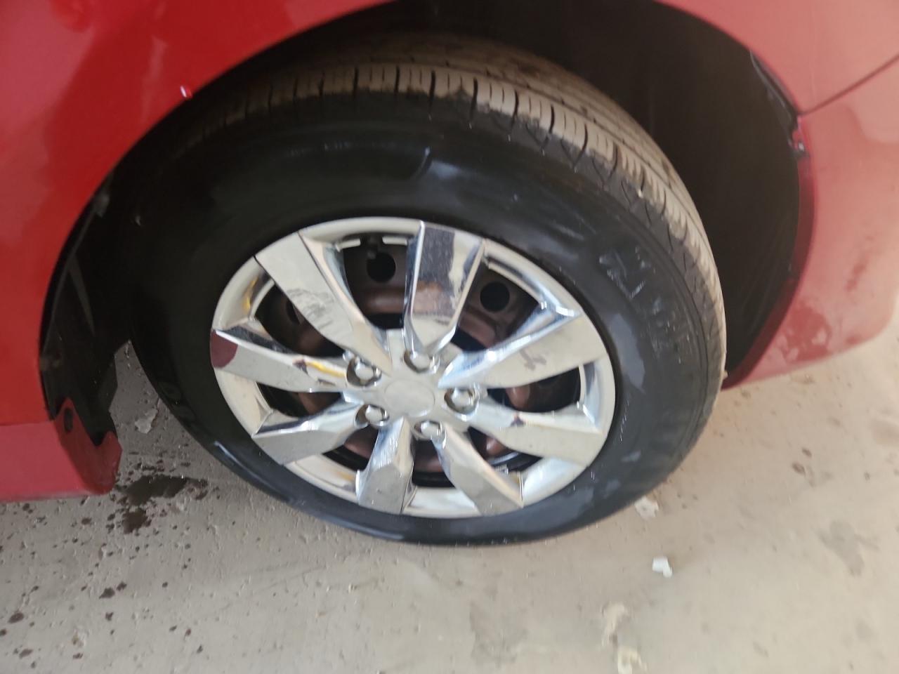 2009 Toyota Corolla Le Red vin: 1NXBU40E69Z151796 Damage: Right Front Wheel, Curb Rash, 5 To 6 Inches