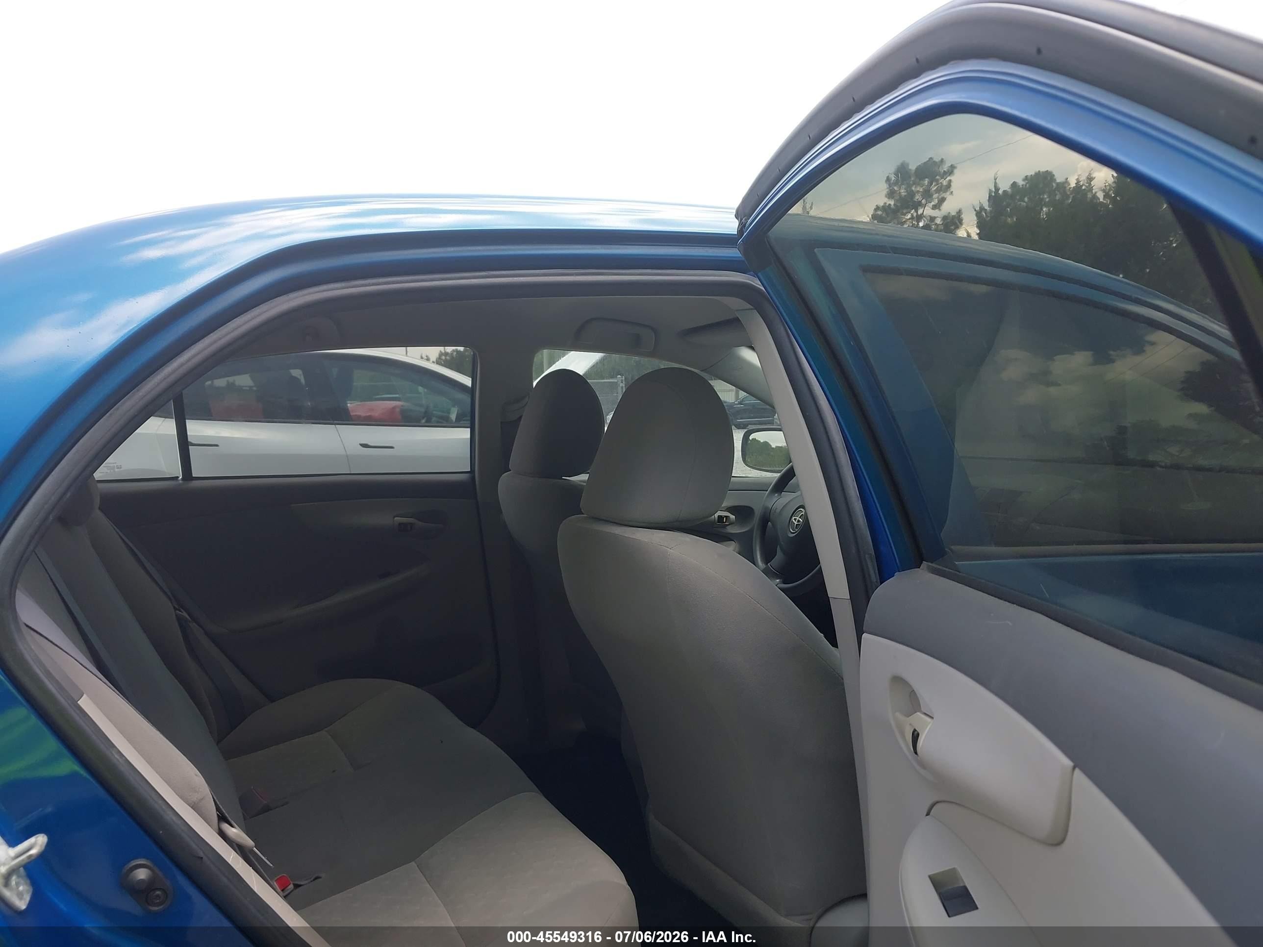 2009 Toyota Corolla Le Синий vin: 1NXBU40E69Z158196