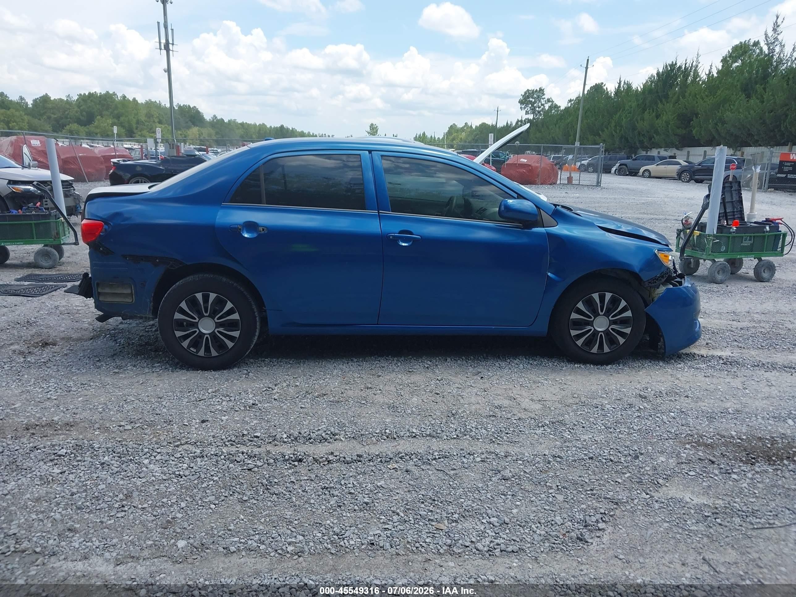 2009 Toyota Corolla Le Синий vin: 1NXBU40E69Z158196