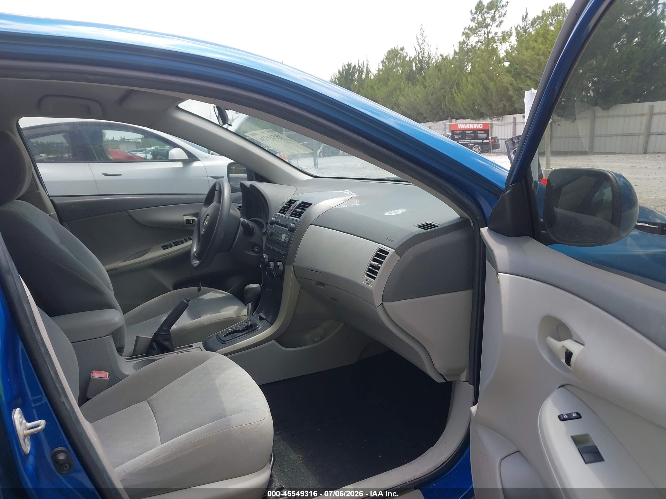 2009 Toyota Corolla Le Синий vin: 1NXBU40E69Z158196