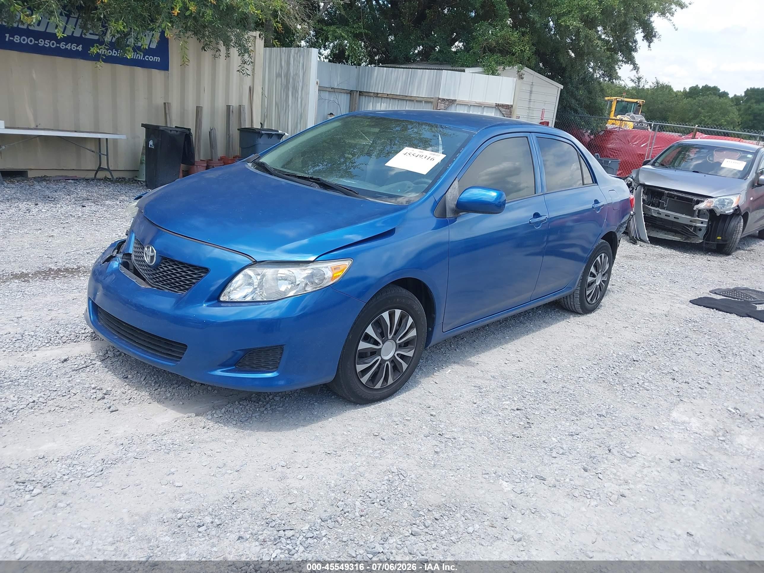 2009 Toyota Corolla Le Синий vin: 1NXBU40E69Z158196
