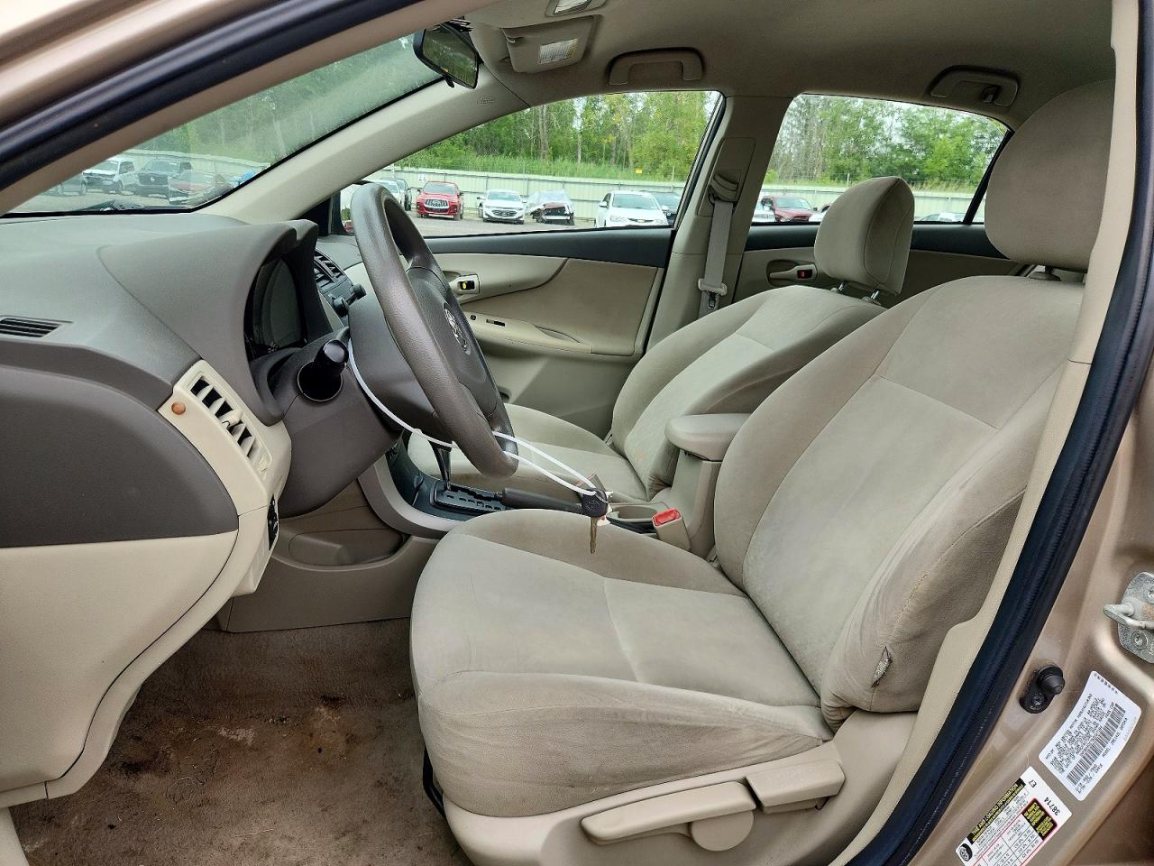 2009 Toyota Corolla Le Gold vin: 1NXBU40E79Z027164