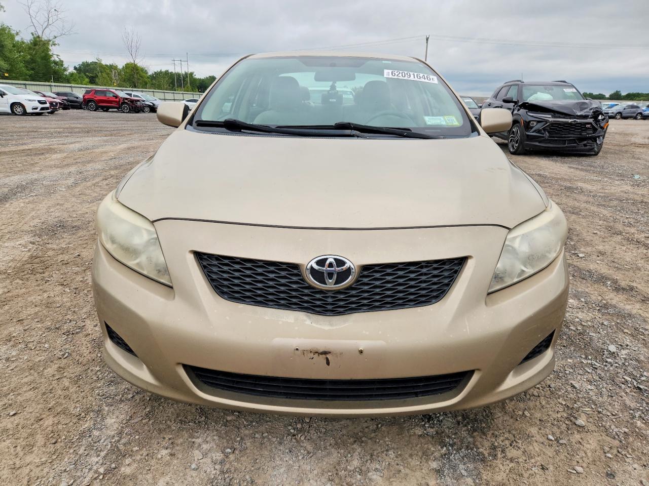 2009 Toyota Corolla Le Gold vin: 1NXBU40E79Z027164