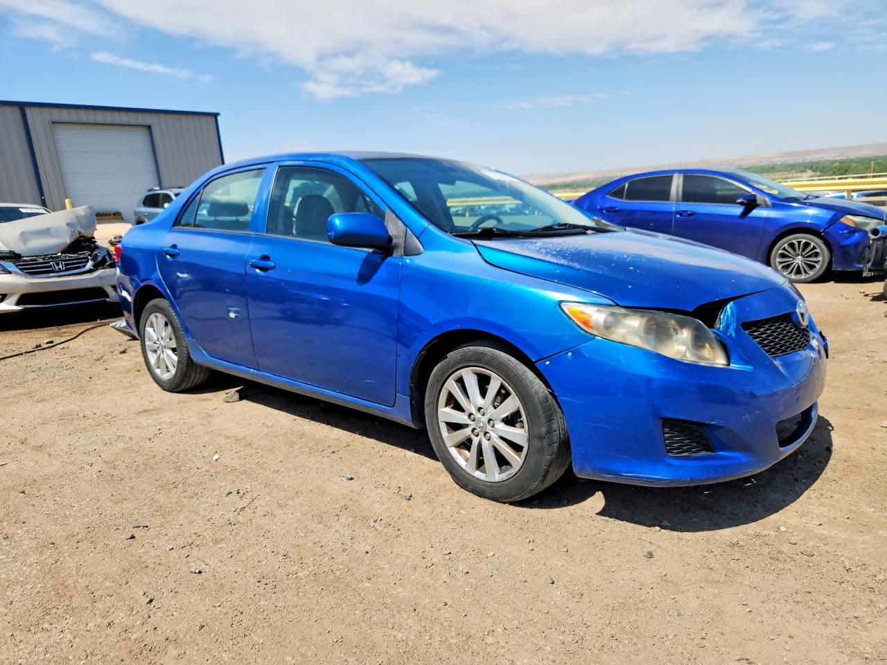 2009 Toyota Corolla Le Blue vin: 1NXBU40E79Z028945