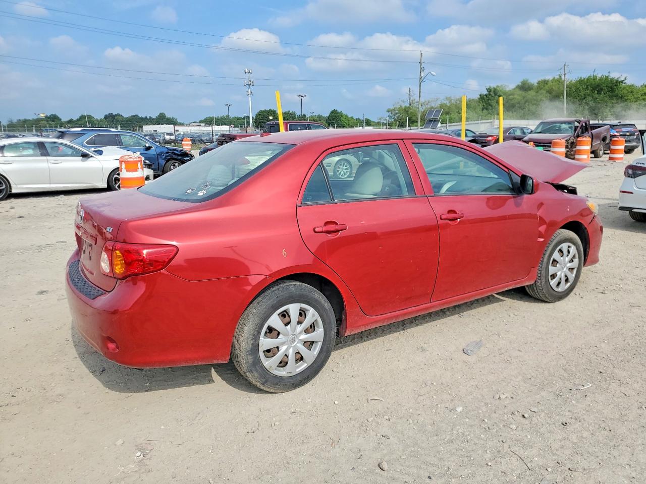2009 Toyota Corolla Le Red vin: 1NXBU40E79Z034874