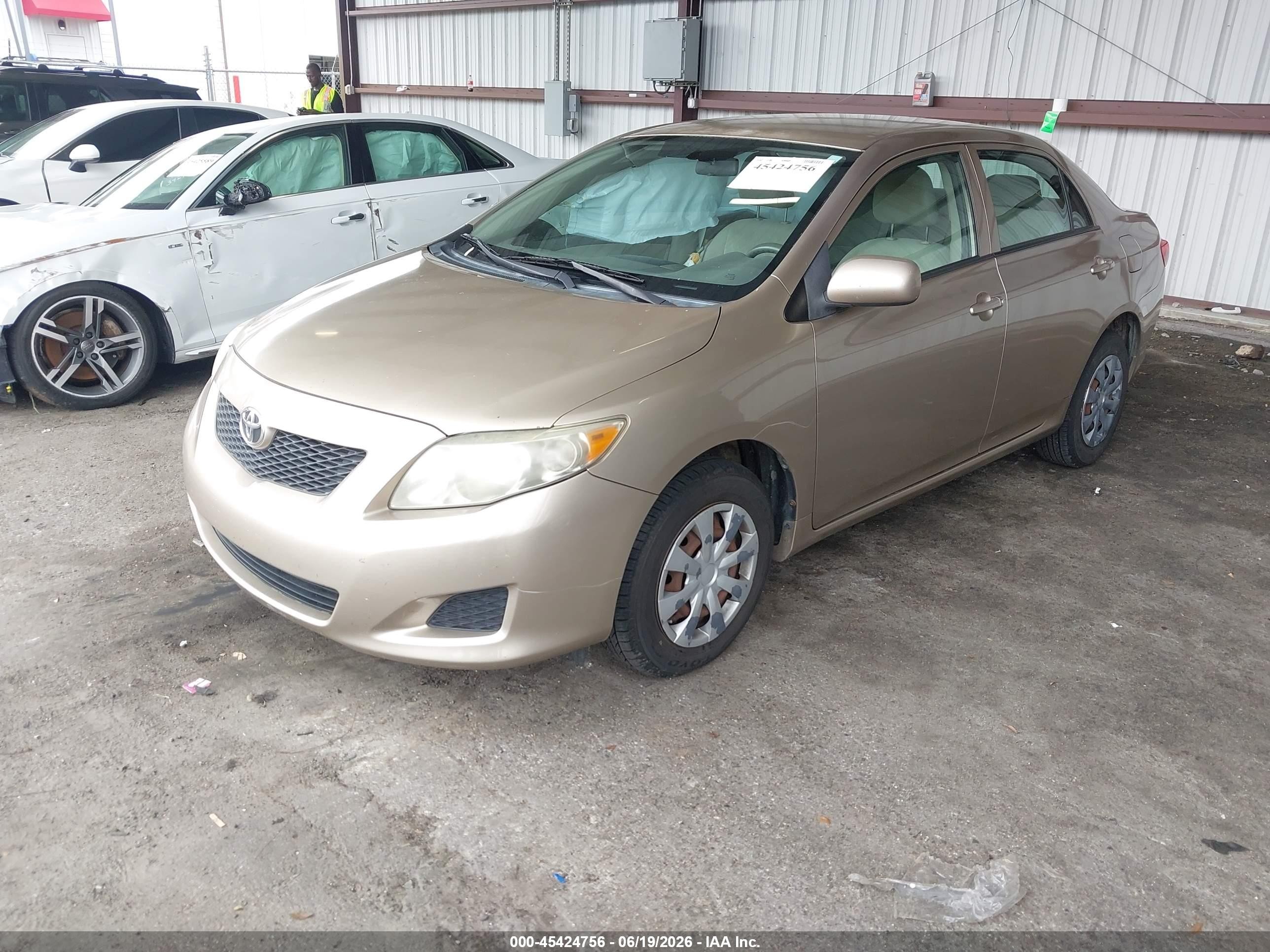 2009 Toyota Corolla Le Gold vin: 1NXBU40E79Z054199