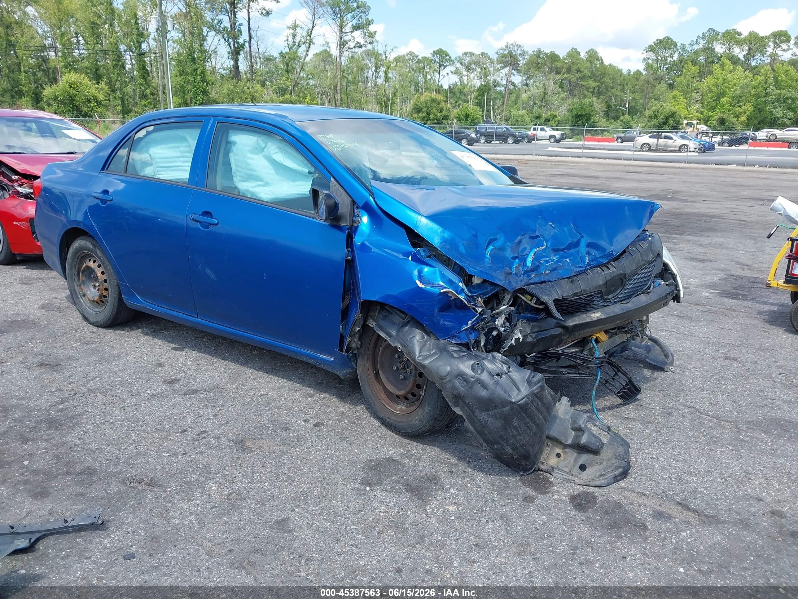 2009 Toyota Corolla   Blue vin: 1NXBU40E79Z061377