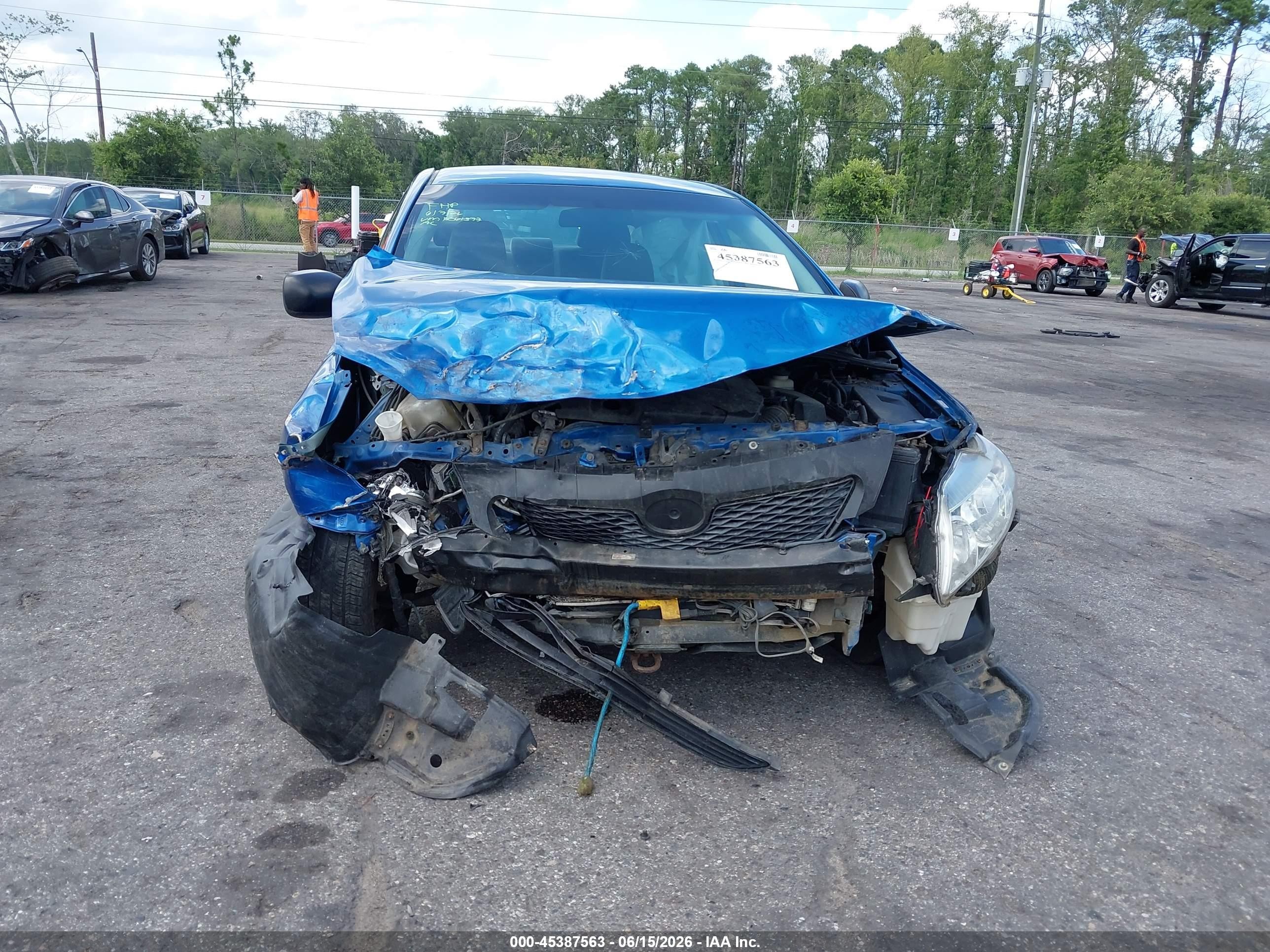 2009 Toyota Corolla   Blue vin: 1NXBU40E79Z061377