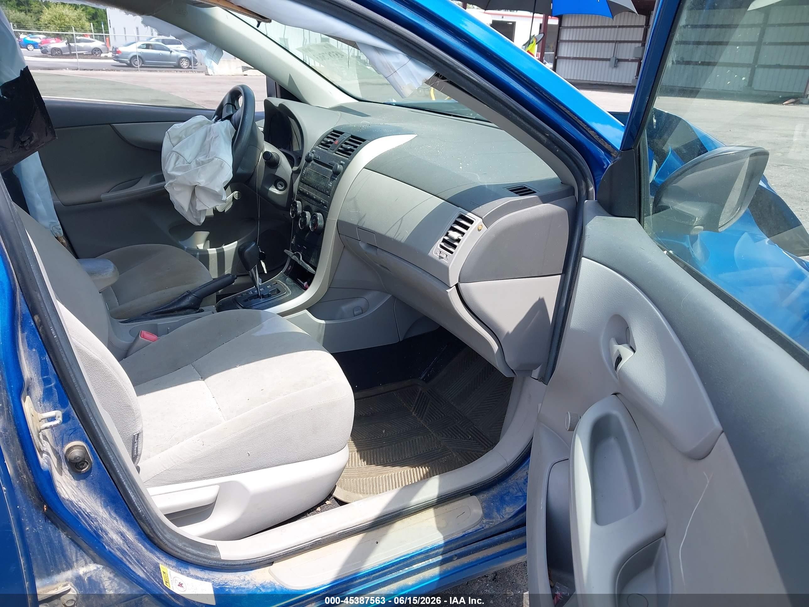2009 Toyota Corolla   Blue vin: 1NXBU40E79Z061377