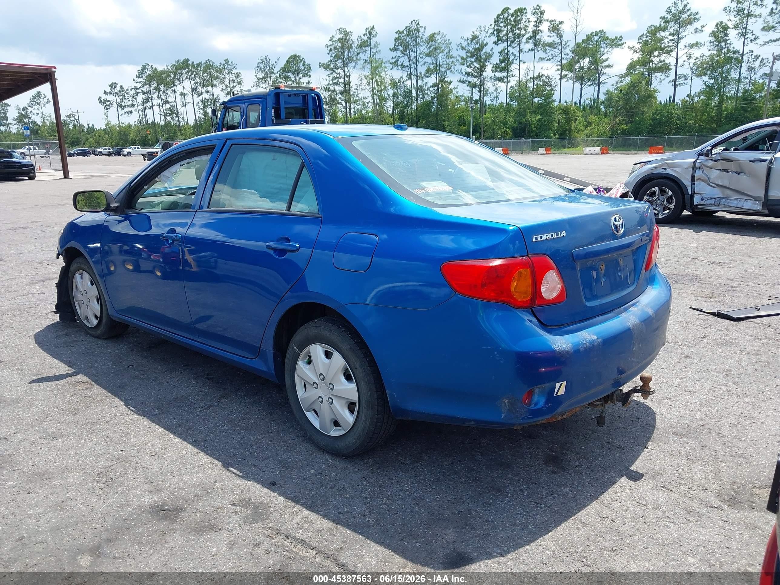 2009 Toyota Corolla   Blue vin: 1NXBU40E79Z061377