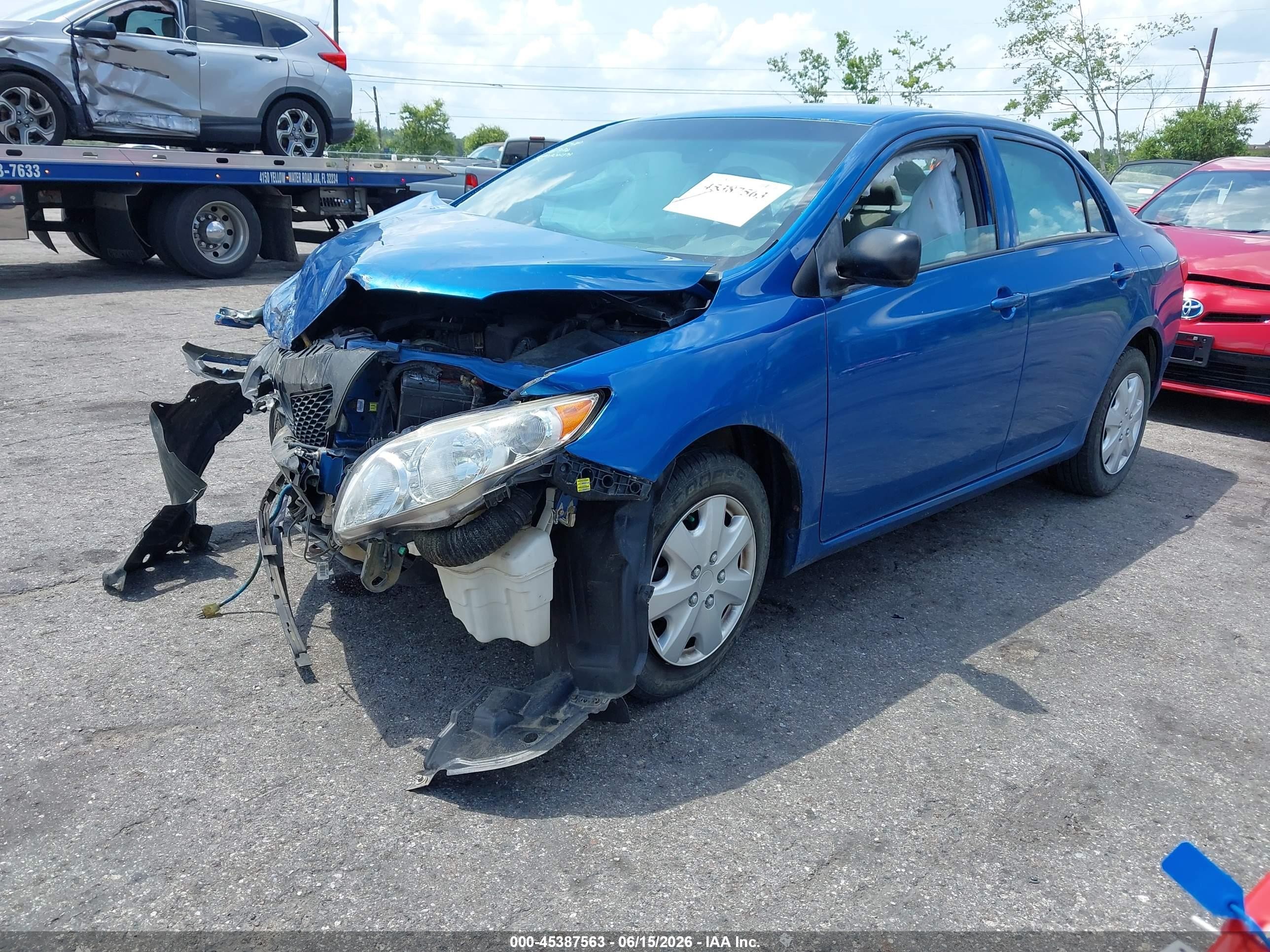 2009 Toyota Corolla   Blue vin: 1NXBU40E79Z061377