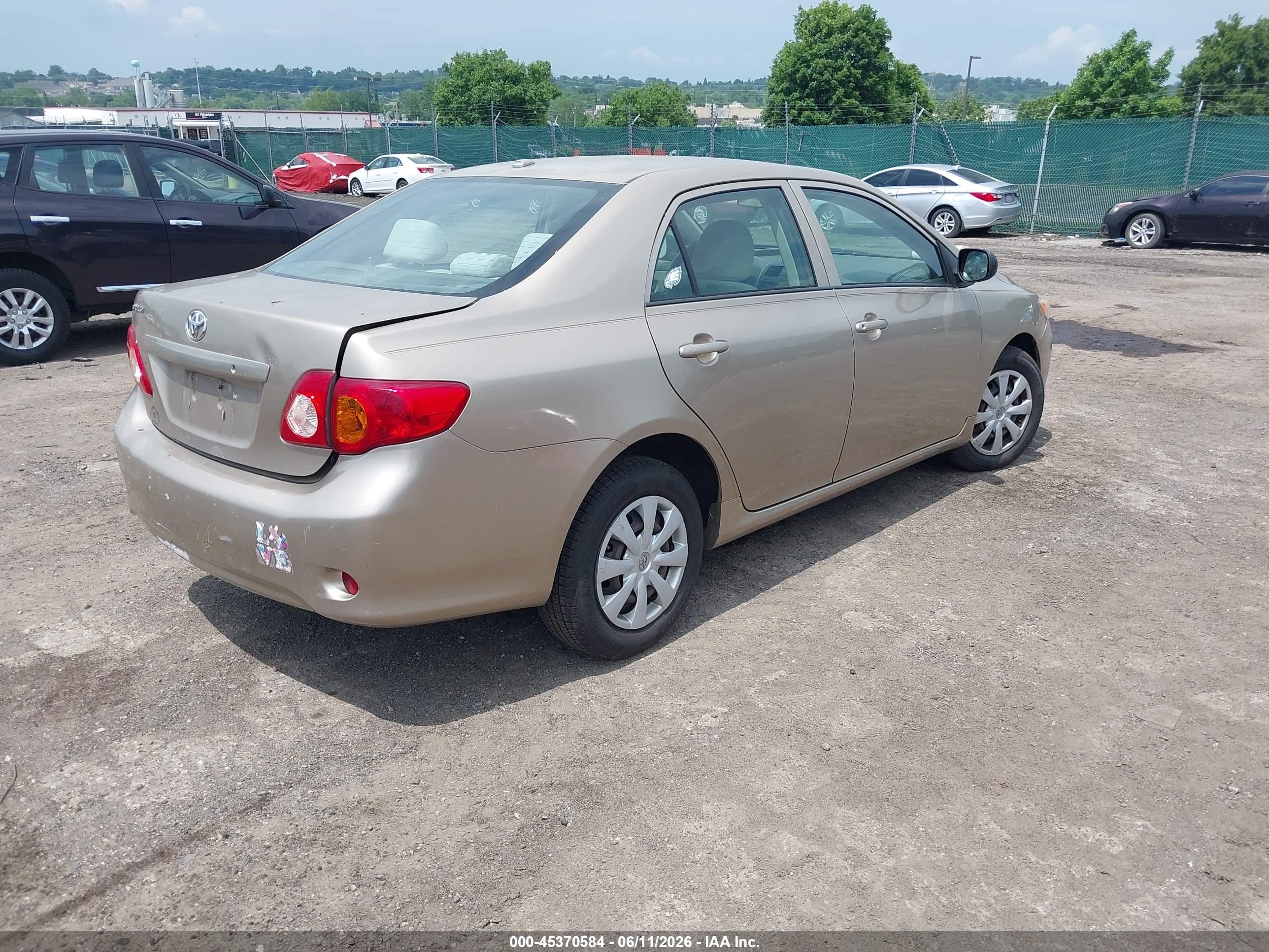 2009 Toyota Corolla   Tan vin: 1NXBU40E79Z078969