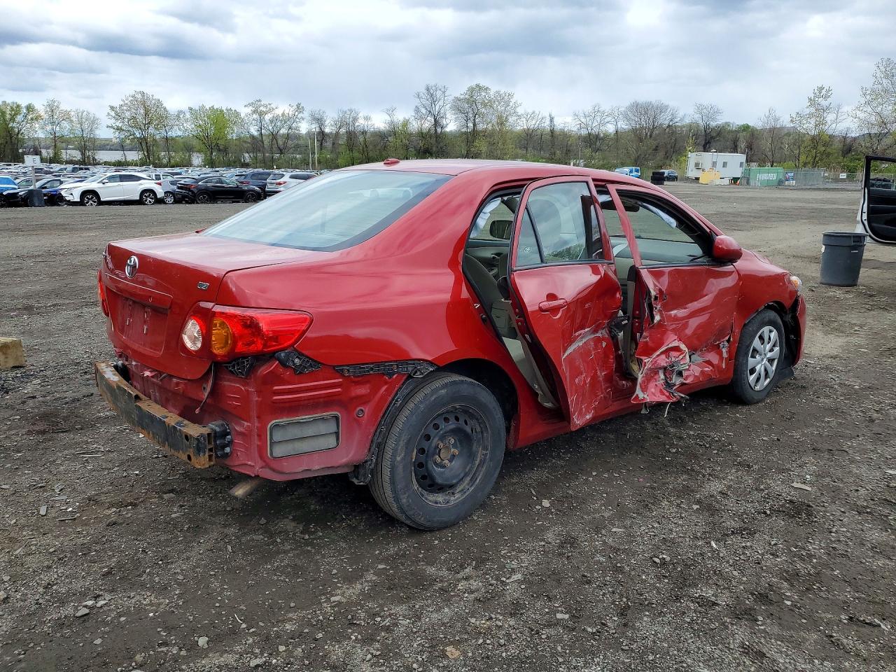 2009 Toyota Corolla Le Red vin: 1NXBU40E79Z103658
