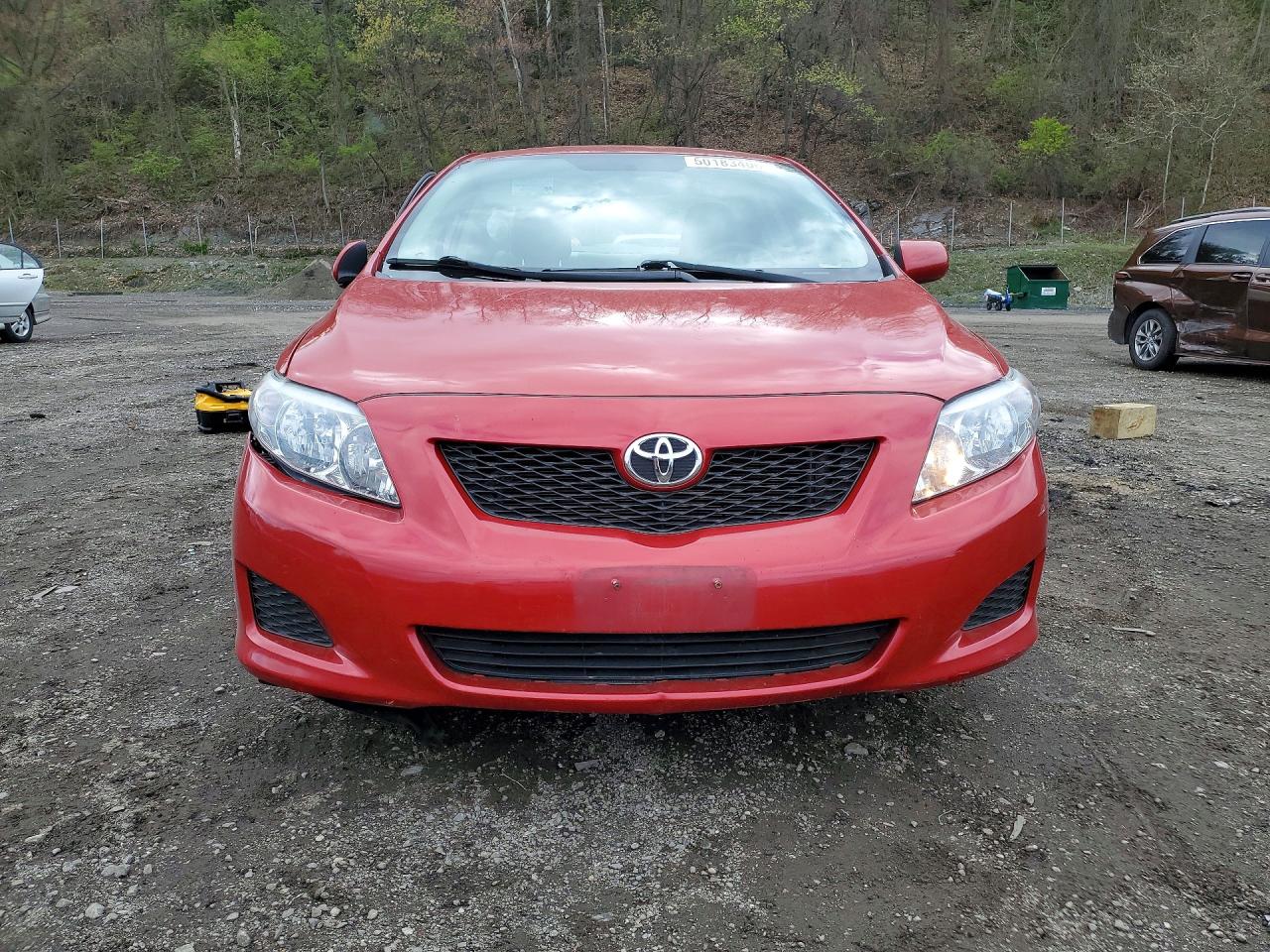 2009 Toyota Corolla Le Red vin: 1NXBU40E79Z103658