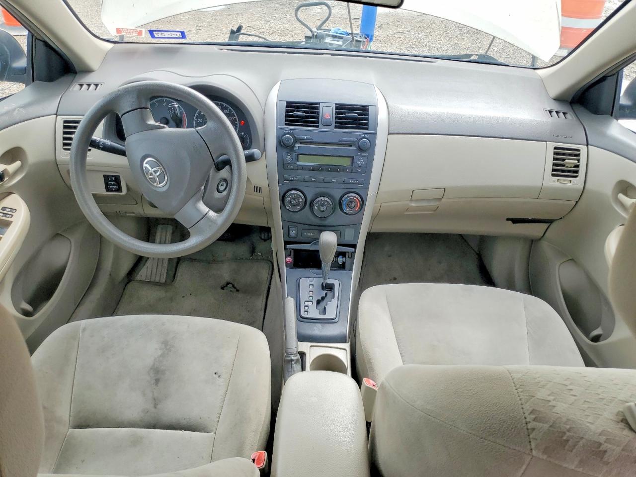 2009 Toyota Corolla Le Tan vin: 1NXBU40E79Z128723