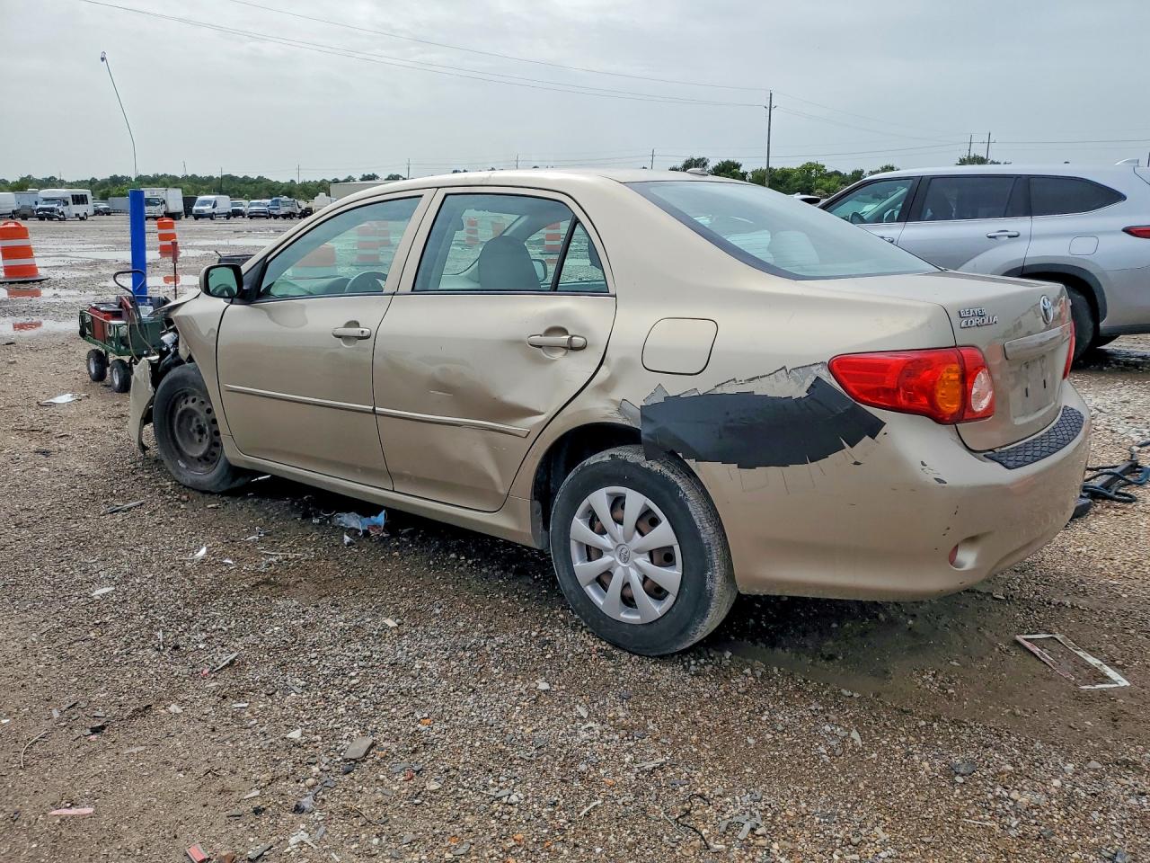 2009 Toyota Corolla Le Tan vin: 1NXBU40E79Z128723
