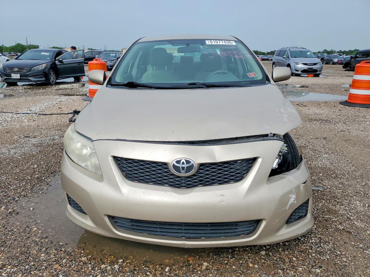 2009 Toyota Corolla Le Tan vin: 1NXBU40E79Z128723