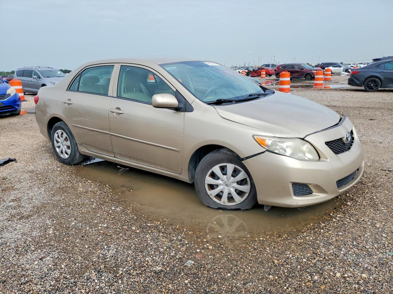 2009 Toyota Corolla Le Tan vin: 1NXBU40E79Z128723
