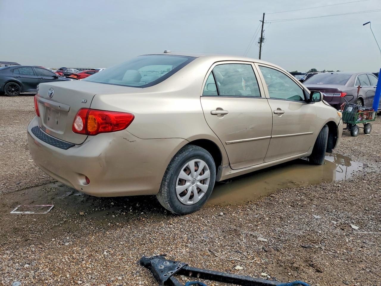 2009 Toyota Corolla Le Tan vin: 1NXBU40E79Z128723