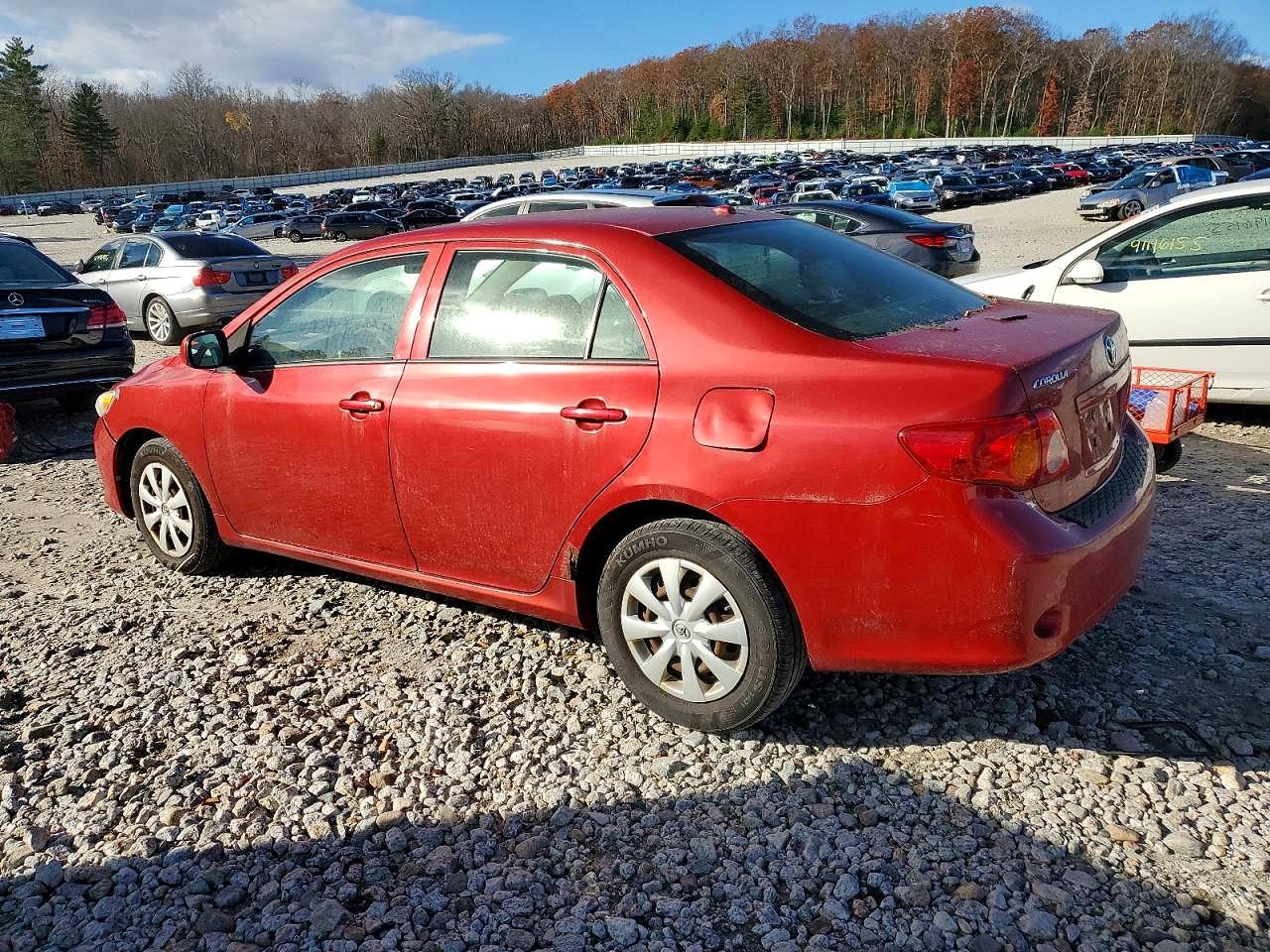2009 Toyota Corolla Le Red vin: 1NXBU40E79Z158630