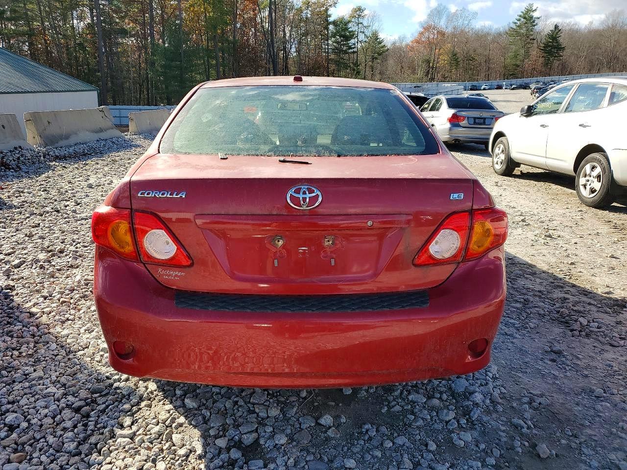 2009 Toyota Corolla Le Red vin: 1NXBU40E79Z158630