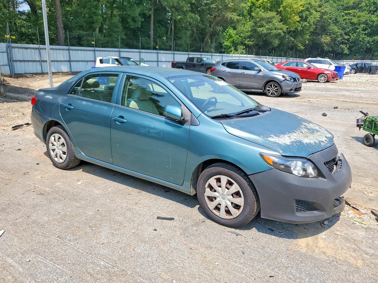 2009 Toyota Corolla Le Teal vin: 1NXBU40E79Z160832